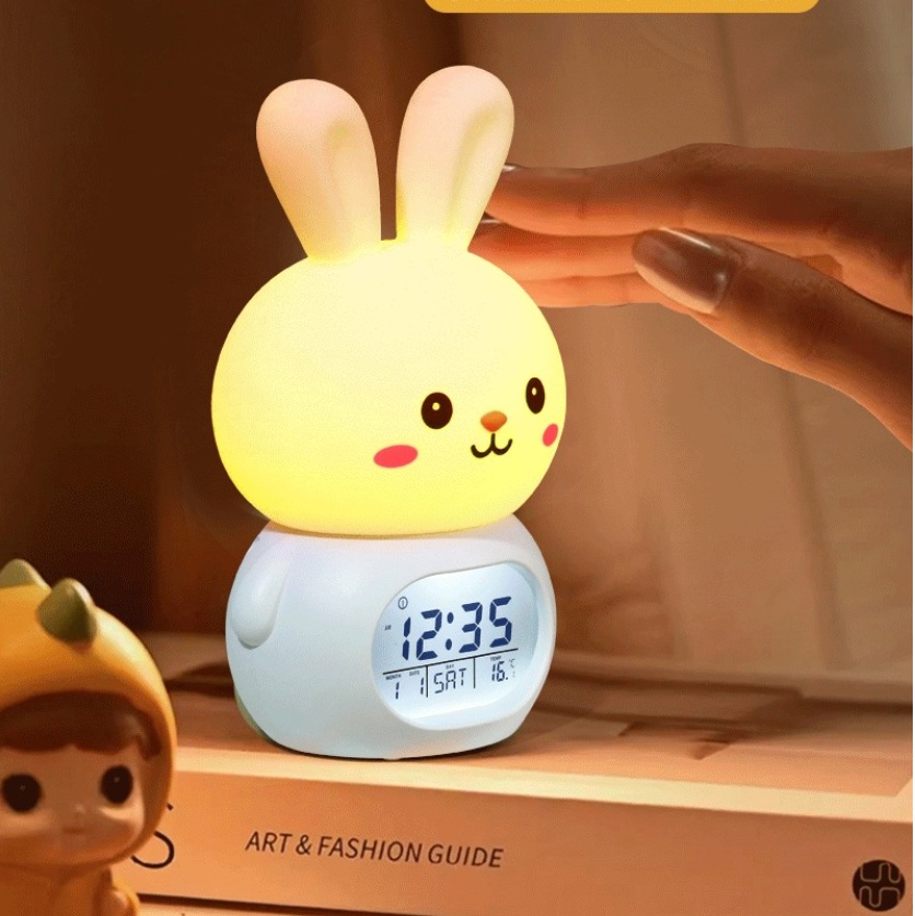 JD-9117 Jam Lucu Bentuk Kelinci Ada Lampu Tidur Alarm LED Clock Weker Suhu Tanggal Jam Bahan Empuk Cocok Jadikan Hadiah